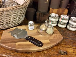 A wooden cutting board with some food on it