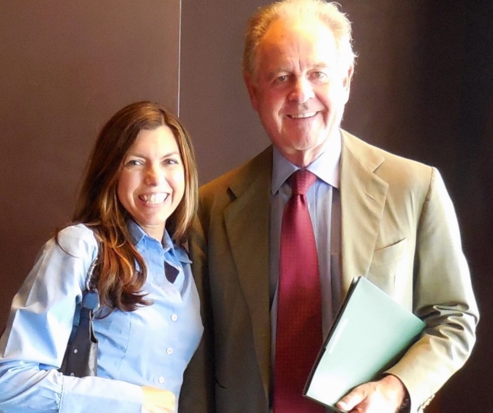 A woman and man standing next to each other.